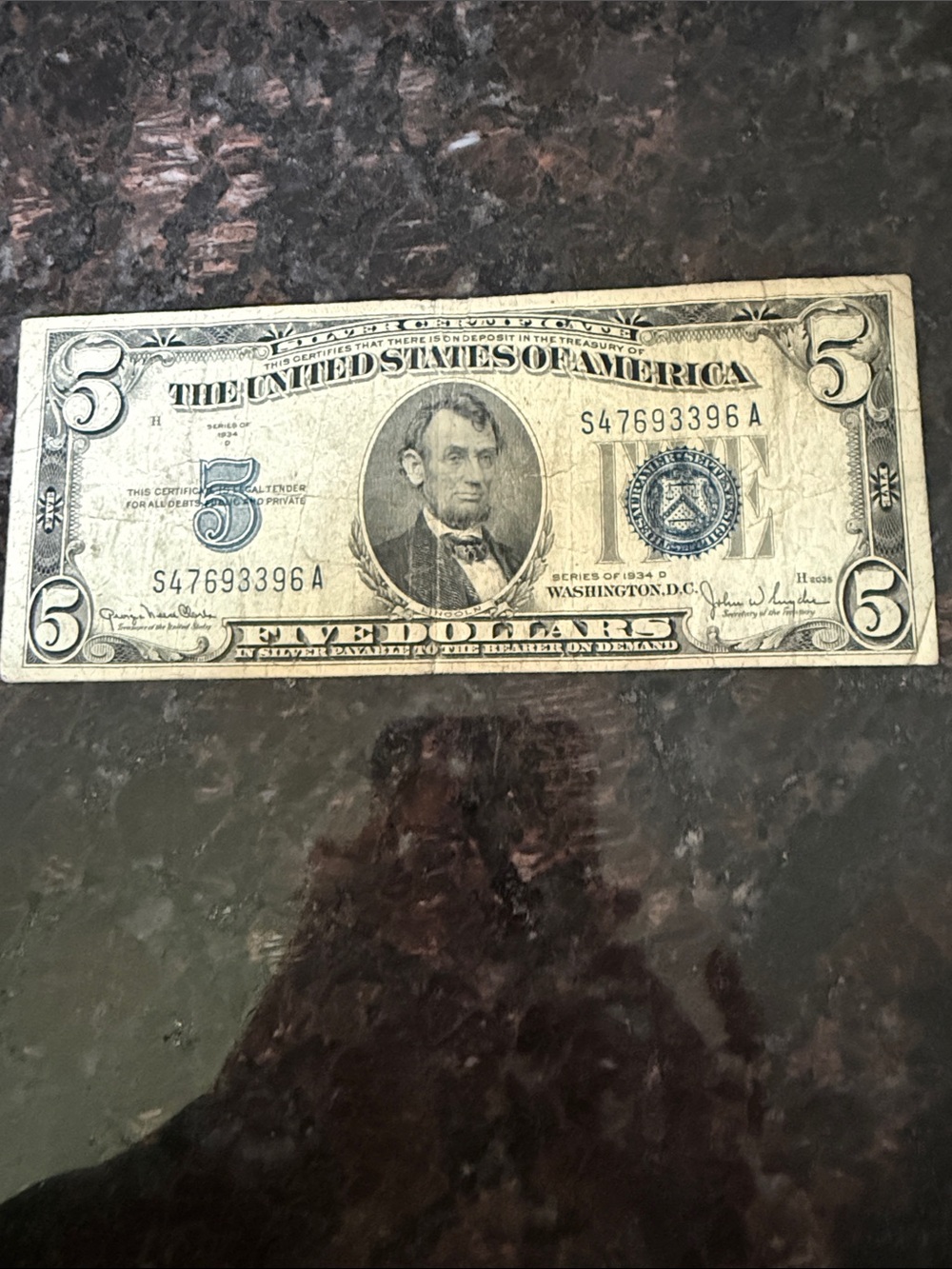 $5 Silver Certificate, series 1934D with a blue seal.  Serial number S47693396A.